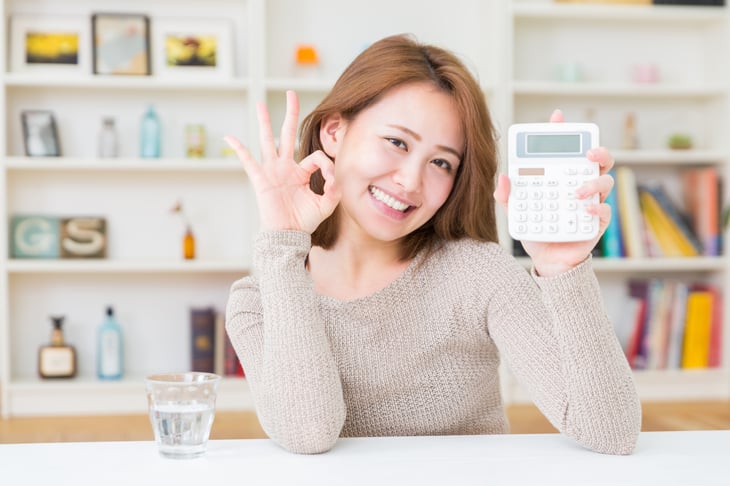 Woman showing her savings