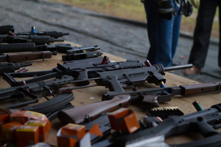 Guns on a table.