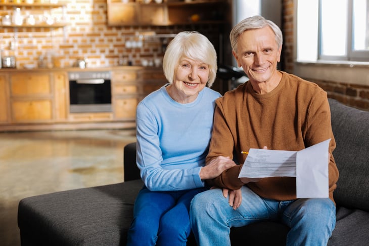 Couple Elderly w Papers