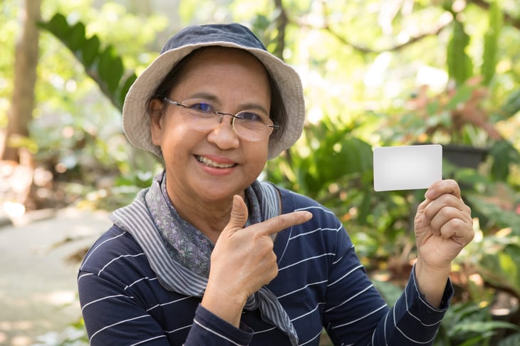 Senior woman with credit card