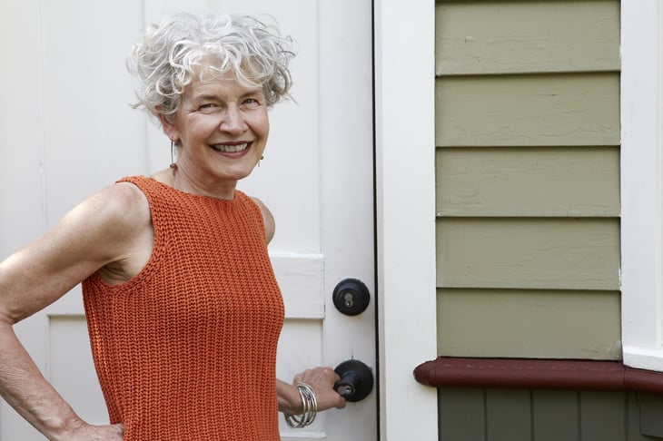 Senior woman outside home