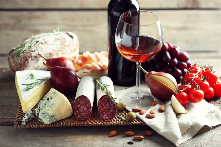 Wine and bread and cheese spread.