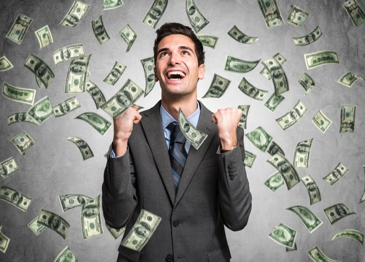 Rich, happy man with raining money