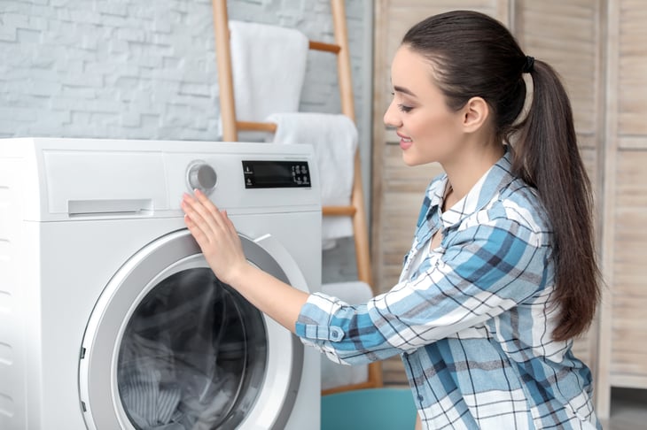 Woman washing laundry
