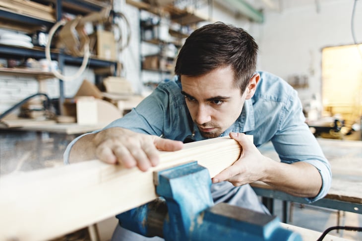 Carpenter sanding wood
