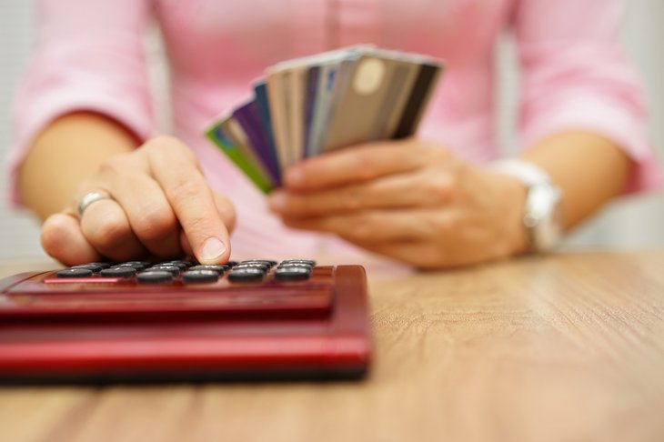 Hand holding credit cards