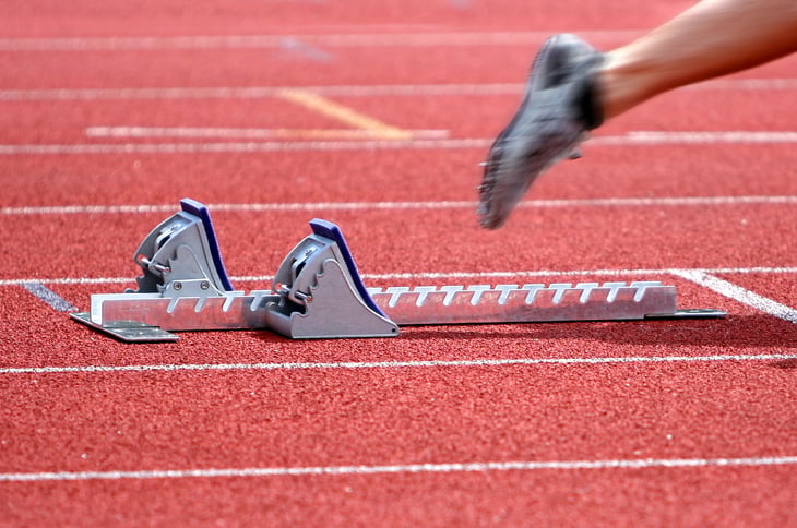 Close up of a sprinter's feet at race start.