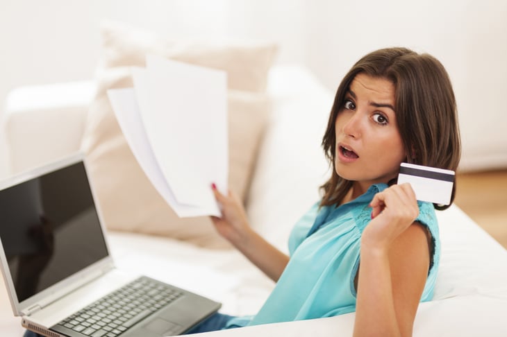 woman w computer credit card