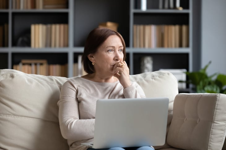 Woman worrying about her target-date funds