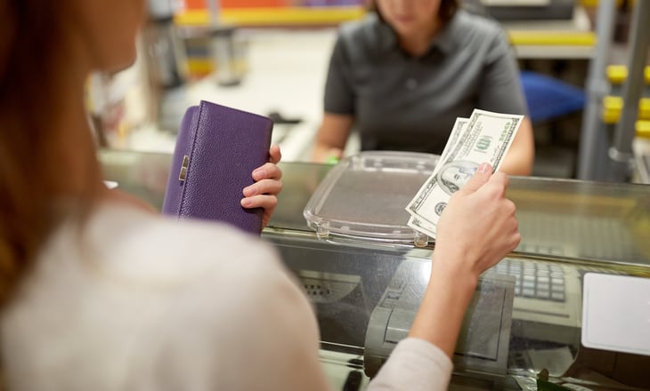 Shopper at a cash register