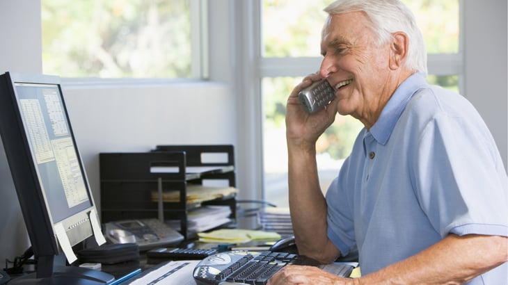 Older man working online
