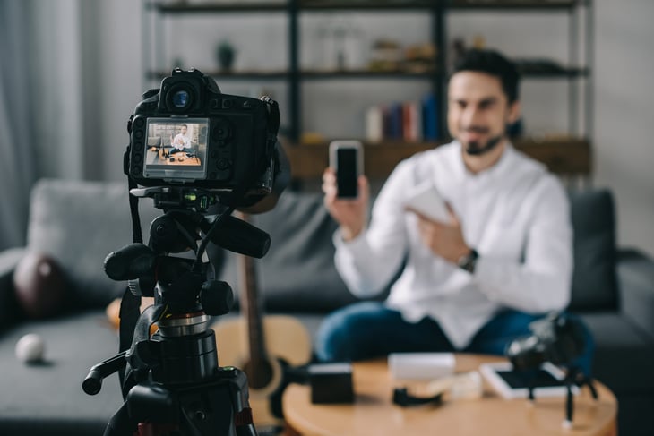 Man shooting a video blog