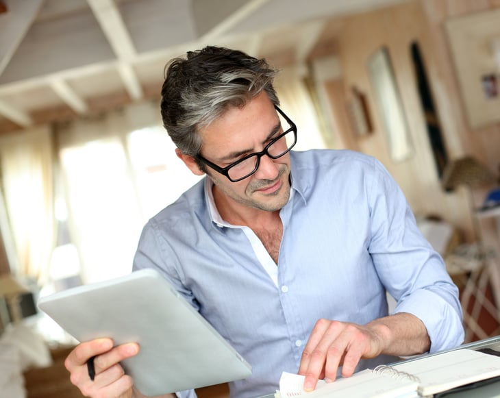 Middle aged man working from home