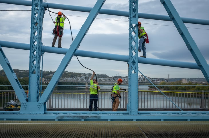 Cable workers on a bridge in Ohio