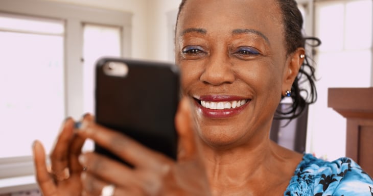 African American woman with cellphone