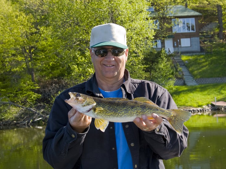 Wisconsin man showing off fish