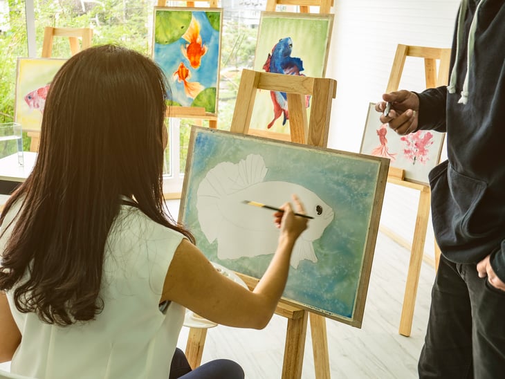 Teacher and student in an art class
