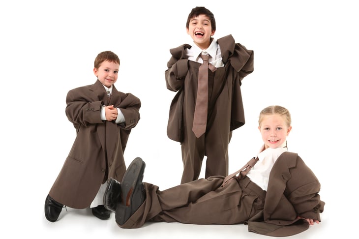 Kids playing dress up.