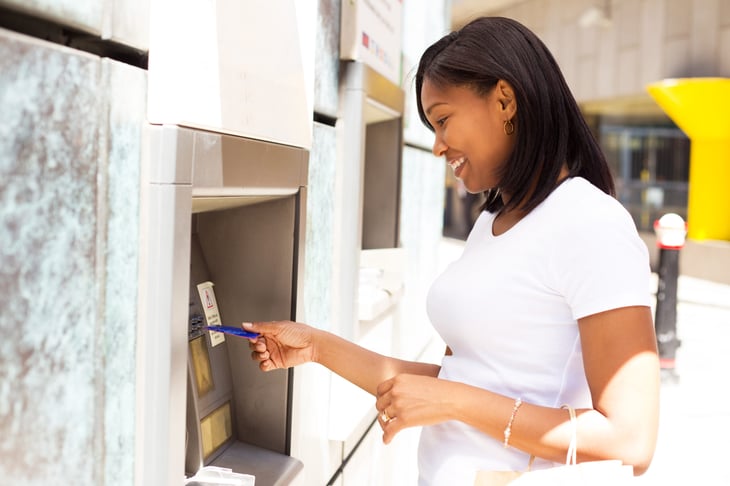 Woman using an ATM