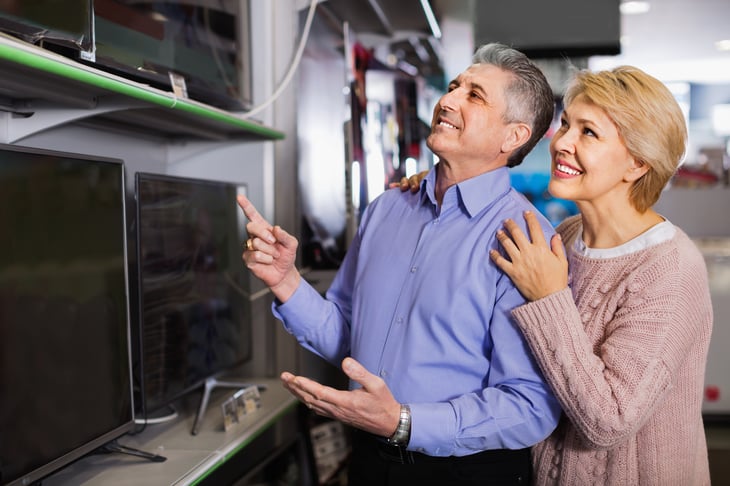 Couple shopping for TV