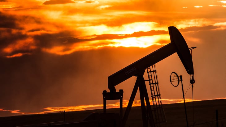 North Dakota oil rig at sunset