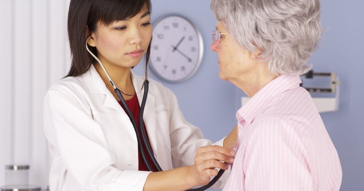 Older woman with doctor