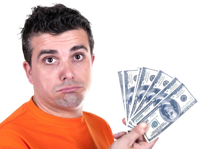 Unhappy man with money