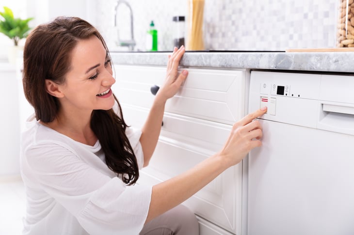 Woman with dishwasher