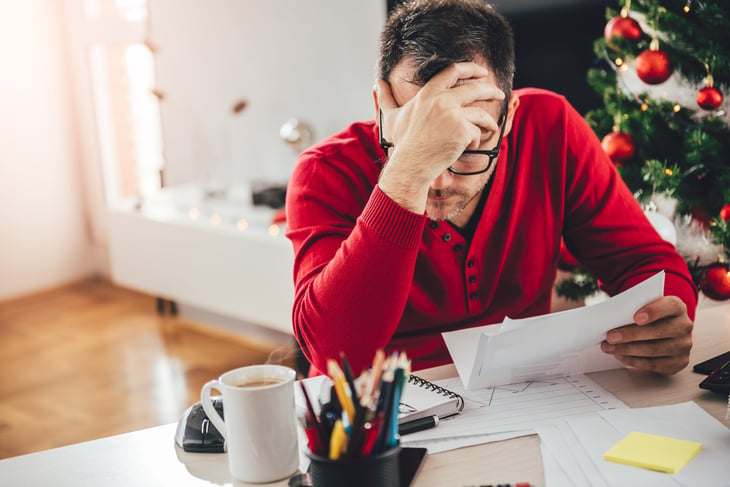 Man stressed about holiday debt