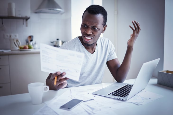 A man is angered by a bill