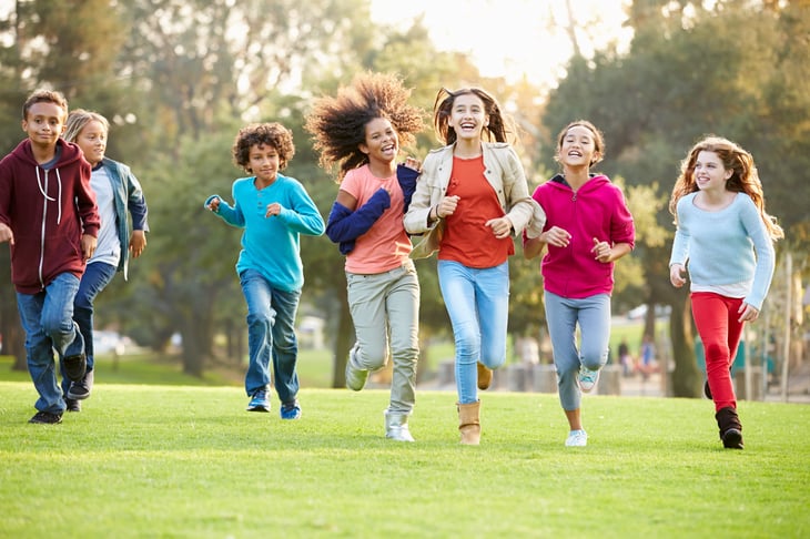 Children running in a park