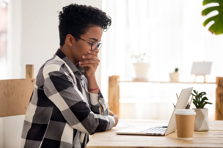 Woman stressed at computer