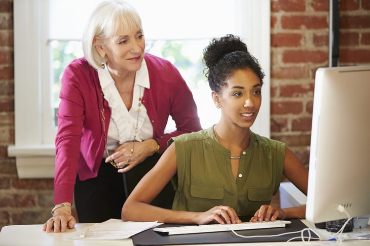 Two women working