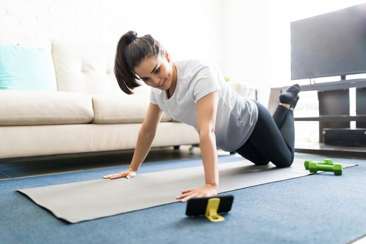 Woman working out at home