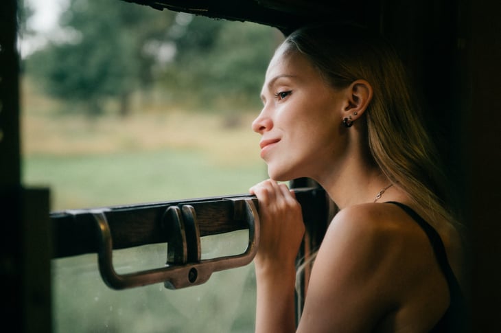 Woman riding a train