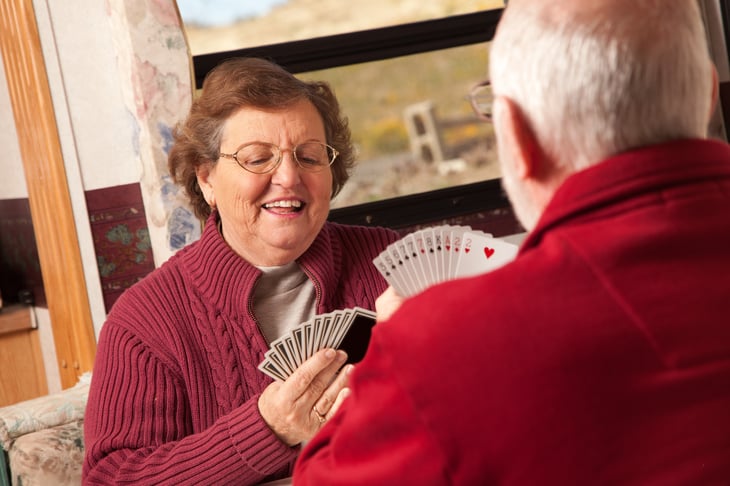 Couple playing cards in RV