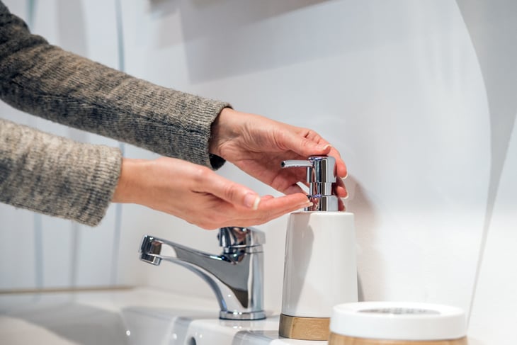 Woman washing her hands