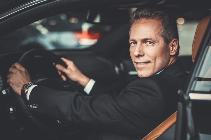 Senior driver in car