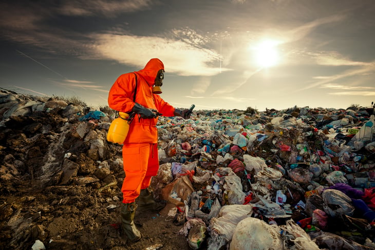 Environmental engineer measuring air pollution municipal landfill