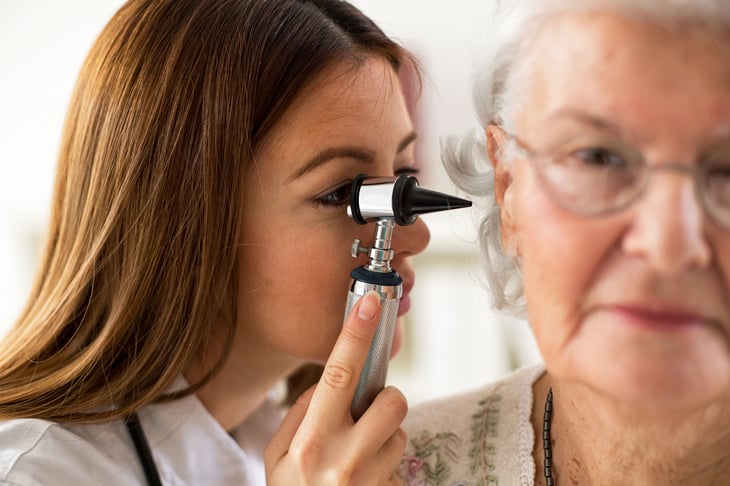 Doctor examining a senior patient