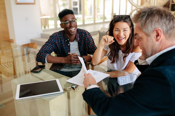 Realtor Real estate agent with clients