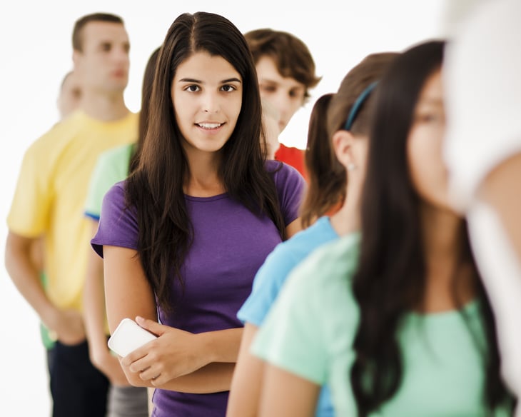 Young woman waiting in line
