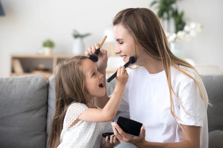 Mother and daughter with makeup