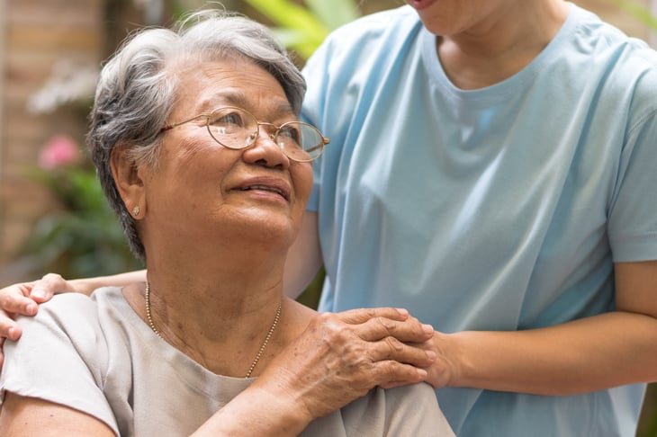 A senior patient receives health care