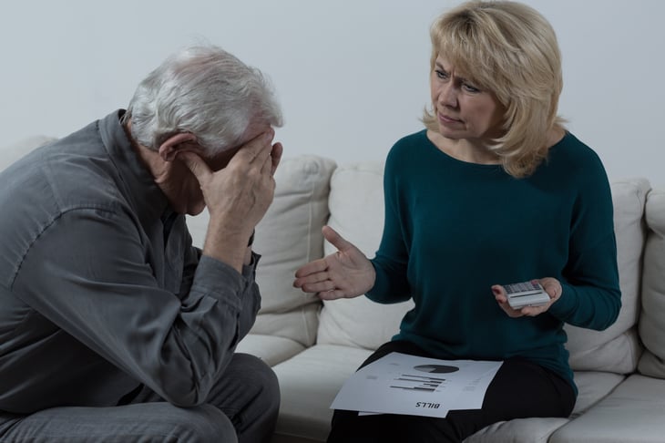 A retired couple argues about financial problems