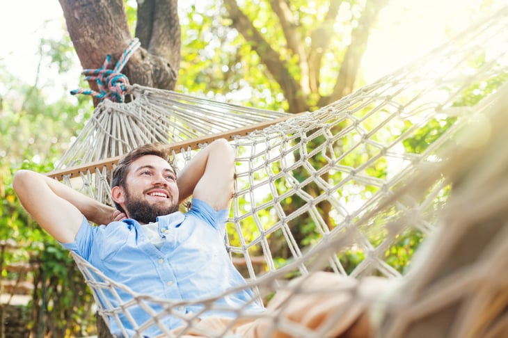 Man relaxing in a hammock