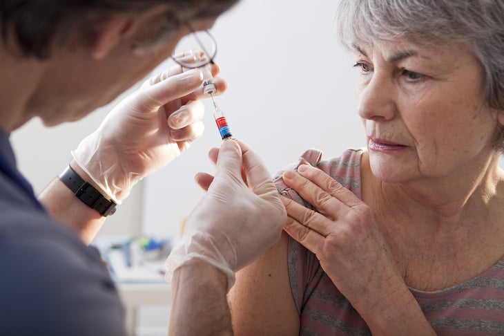 Senior woman getting vaccine