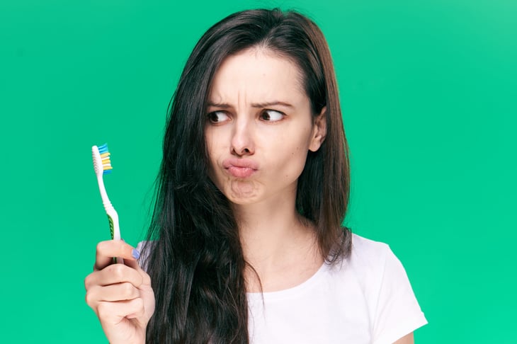 Woman with toothbrush