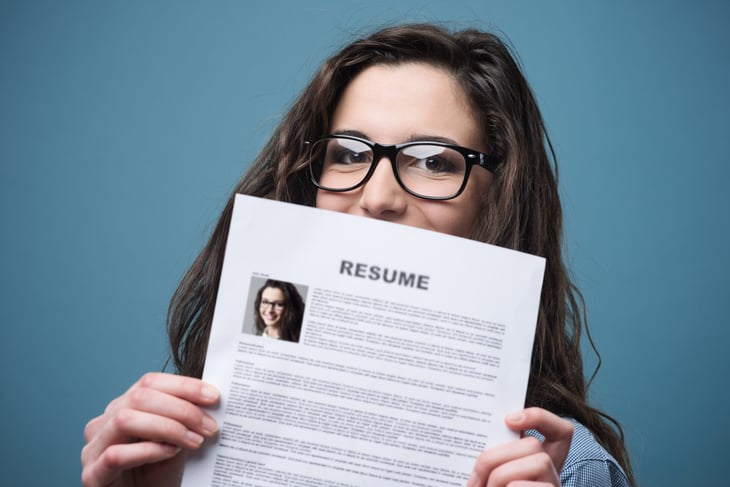 Young woman with resume