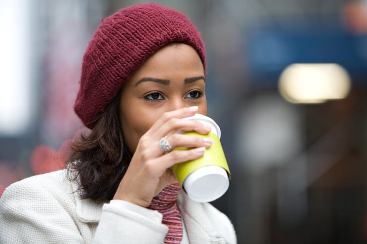 Woman sipping coffee